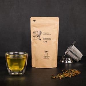 Genmaicha Verpackung mit Teeglas und Teeblättern