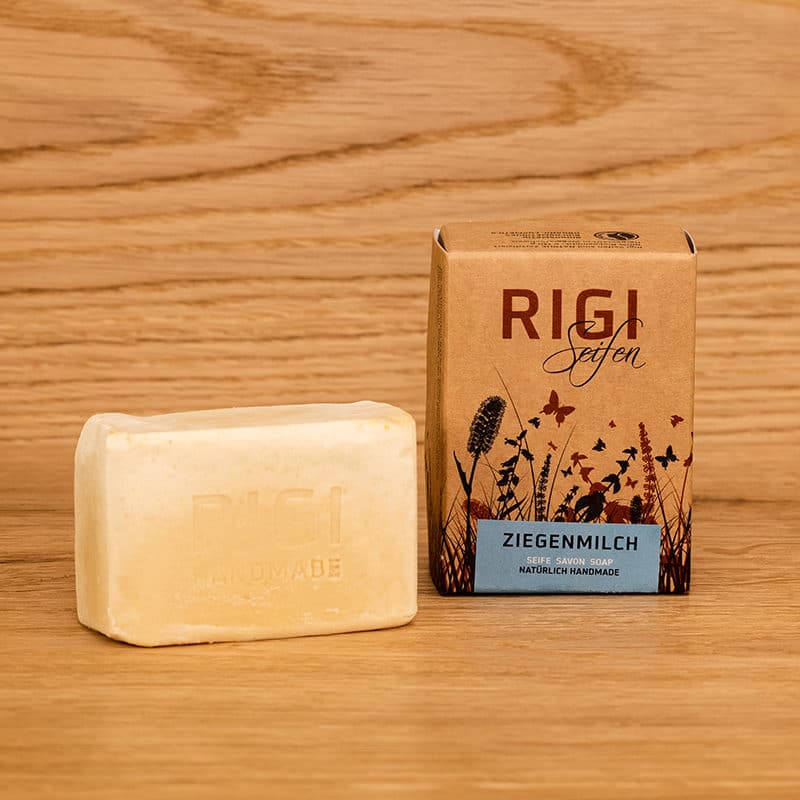 Ziegenmilchseife ausgepackt und Kartonverpackung daneben